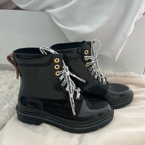 See by Chloe rain boots